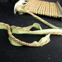 Stock/Europatex Cord 873 Childs Play Red Gold Green Lip Cord Trim